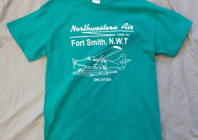 Green t-shirt with airplane logo